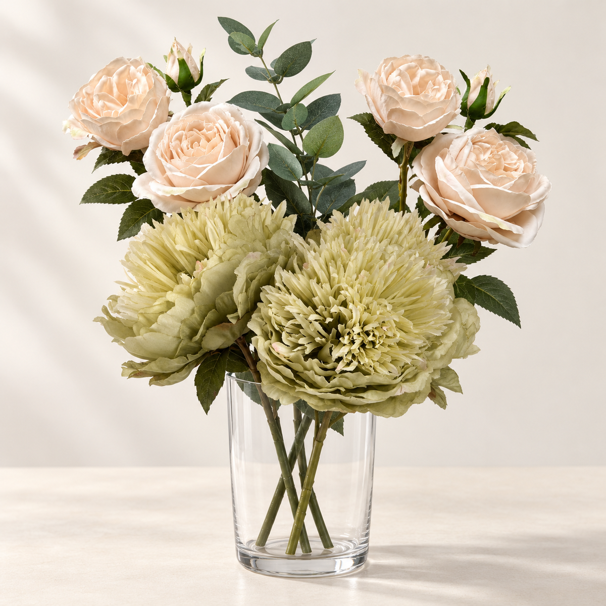 Sage & Blush artificial flowers styled in a clear glass vase. AI-generated illustration; vase not included.