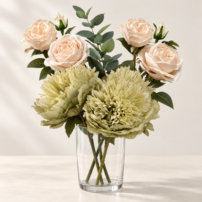 Sage & Blush artificial flowers styled in a clear glass vase. AI-generated illustration; vase not included.
