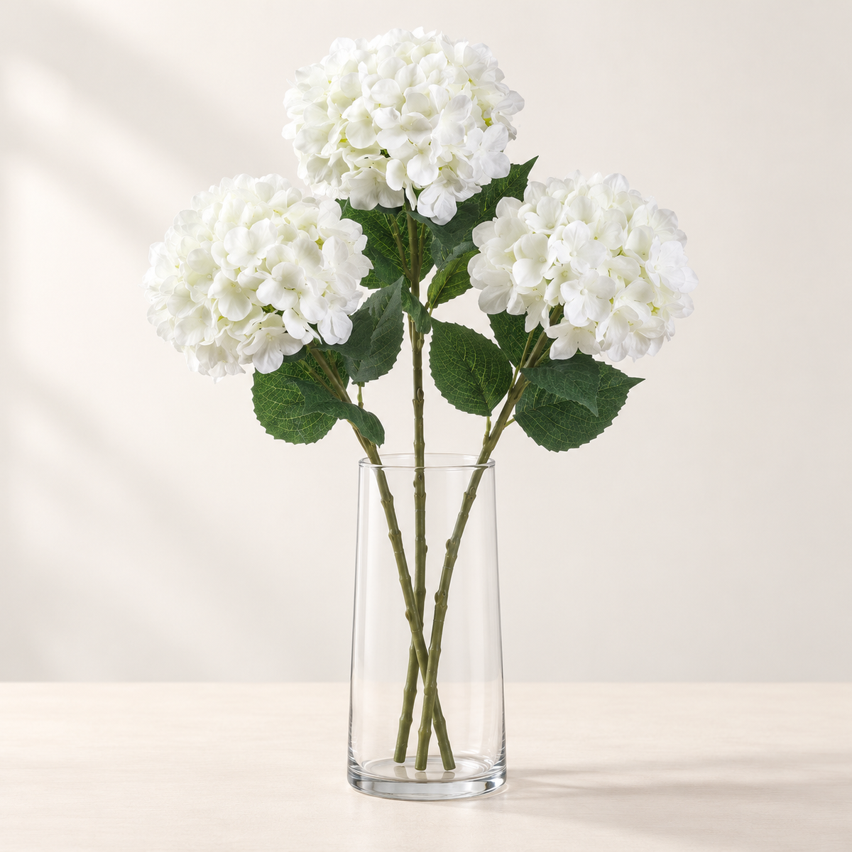 White Hydrangea (3 stems) artificial flowers in a clear glass vase. AI-generated styling illustration; vase not included.