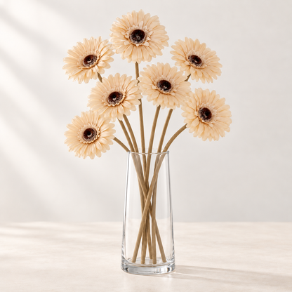 Cream Gerbera (7 stems) artificial flowers in a clear glass vase. AI-generated styling illustration; vase not included.