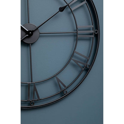 Maroven 59cm Dia Matt Black Metal Wall Clock – in a room setting